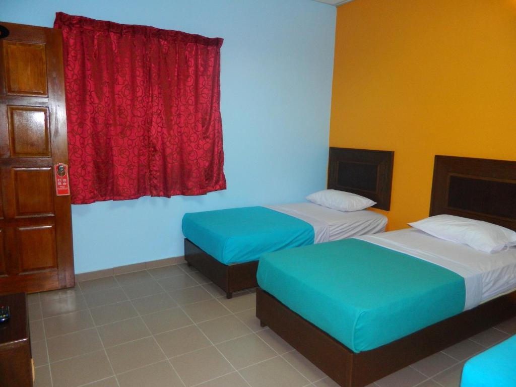 River Side Hotel Mersing Habitación foto